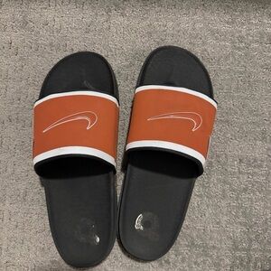 Nike Black and Orange Slides with White Logo